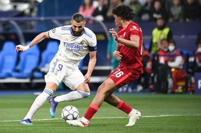 Karim Benzema je bil izbran za najboljšega igralca letošnje sezone lige prvakov. FOTO: Anne-Christine Poujoulat/AFP
