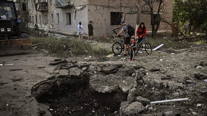 Fotografija: Uničenje v Donbasu. FOTO: Aris Messinis/AFP

