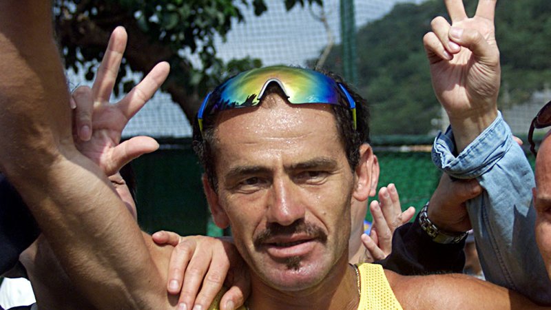 Fotografija: Yiannis Kouros je še vedno lastnik svetovnih rekordov v teku na tisoč kilometrov in tisoč milj ter na 48-urni in šestdnevni preizkušnji. FOTO: Simon Kwong/Reuters
