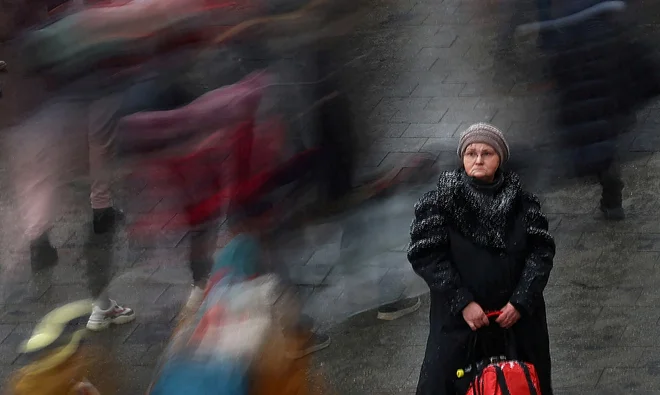 Begunci iz Kijeva. FOTO: Kai Pfaffenbach/Reuters
