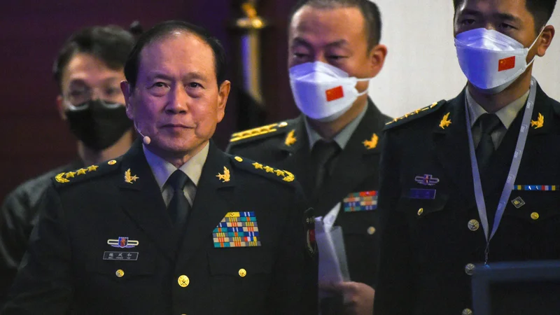 Fotografija: Pol ure, kolikor je Wei Fenghe govoril na varnostnem forumu, je bilo izpolnjene z mešanico obrambe in napadov. FOTO: Roslan Rahman/AFP
