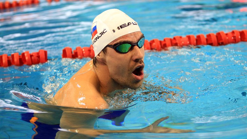 Fotografija: Damir Dugonjić je zadnji slovenski plavalec z naslovom evropskega prvaka v 50-metrskem bazenu. FOTO: Blaž Samec/Delo
