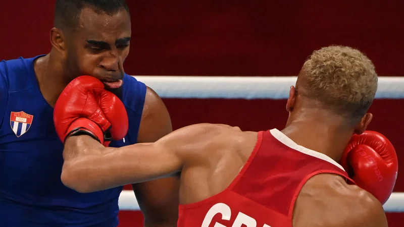 Fotografija: Mednarodna boksarska zveza se nikakor ne more otresti korupcije znotraj organizacije, zaradi katere je ogrožena uvrstitev boksa na olimpijske igre leta 2028. FOTO: Luis Robayo/AFP
