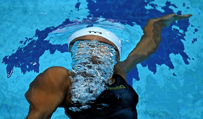 Francozinja Analia Pigree tekmuje na tekmi na 50 m hrbtno med svetovnim prvenstvom v vodnih športih v Budimpešti. Foto: Attila Kisbenedek/Afp