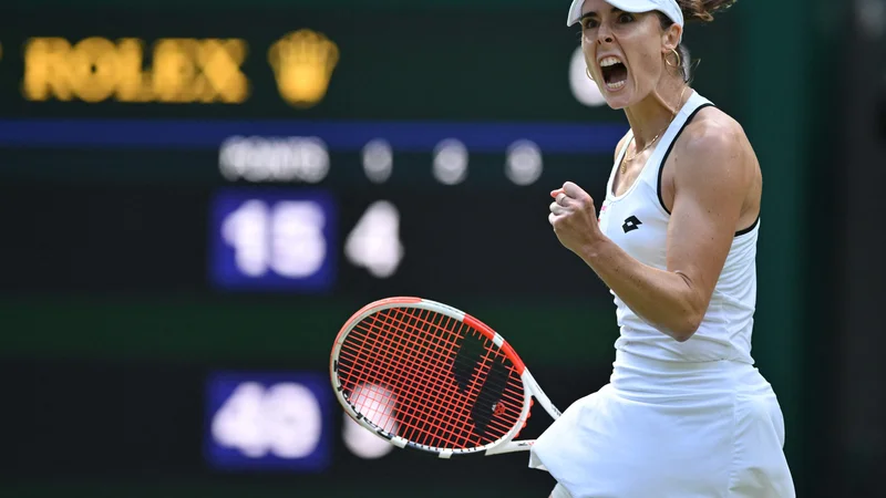 Fotografija: Alize Cornet ni skrivala izjemnega veselja ob zmagi proti prvi favoritinji. FOTO: Glyn Kirk/AFP