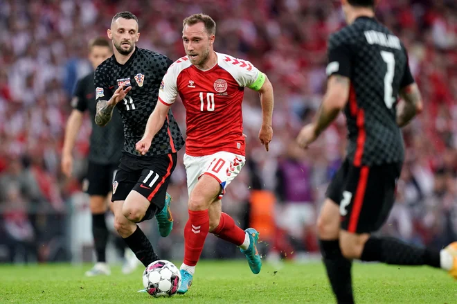 Nič se ne bo spremenilo, Christian Eriksen za Dansko igra v rdečem dresu, tako bo tudi pri Manchester Unitedu. FOTO: Liselotte Sabrø/Reuters
