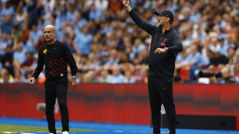 Fotografija: Pep Guardiola in Jürgen Klopp sta velika tekmeca, vendar se tudi spoštujeta. FOTO: Andrew Boyers/Reuters
