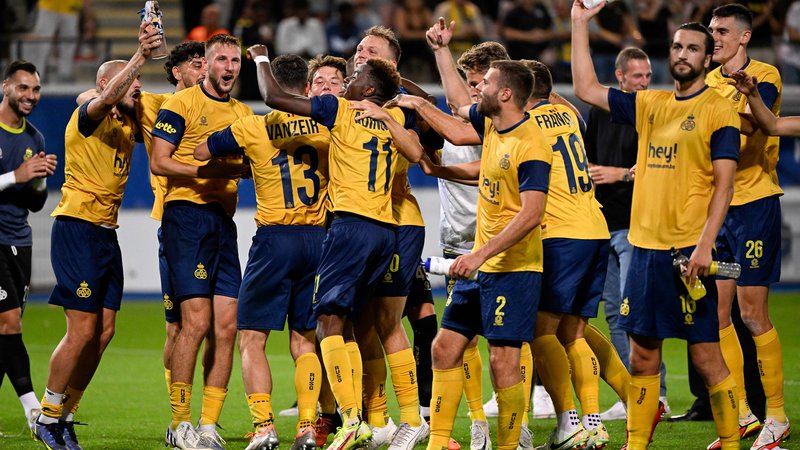 Fotografija: Nogometaši belgijskega prvaka Union Saint-Gilloise so se takole veselili zmage nad Škoti. FOTO: Laurie Dieffembacq/AFP
