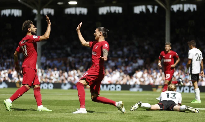 Darwin Nuñez in Mohamed Salah sta Liverpool rešila iz rezultatske zagate. FOTO: Peter Cziborra/Reuters
