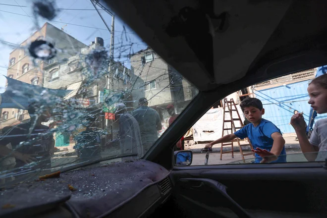 Uničenje po izraelskem bombardiranju. FOTO: Mohammed Abed/AFP
