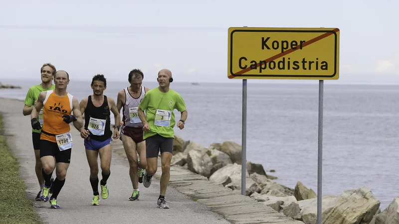 Fotografija: Tokrat pišemo o ljudeh, ki redno tečejo, ne o začetnikih. FOTO: Jože Suhadolnik/Delo
