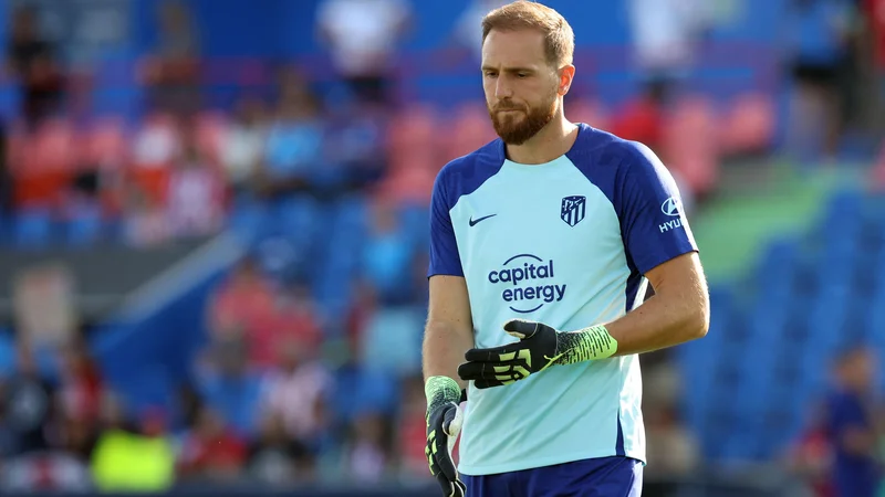 Fotografija: Jan Oblak je z Atleticom odlično štartal v novo sezono. FOTO: Thomas Coex/AFP