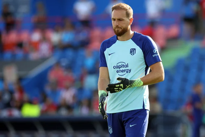 Jan Oblak je z Atleticom odlično štartal v novo sezono. FOTO: Thomas Coex/AFP
