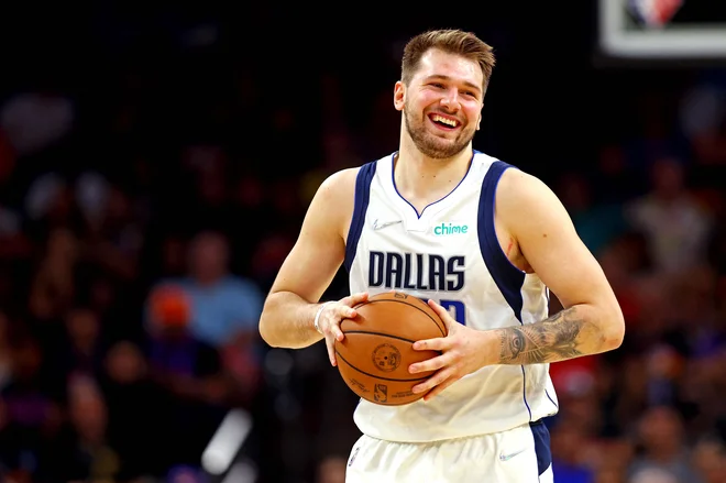 Luka Dončić bo sezono začel pri Phoenix Suns. FOTO: Mark J. Rebilas/USA Today Sports
