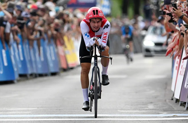 Stefan Bissegger je bil najhitreši v vožnji na čas. FOTO: Christof Stache/AFP
