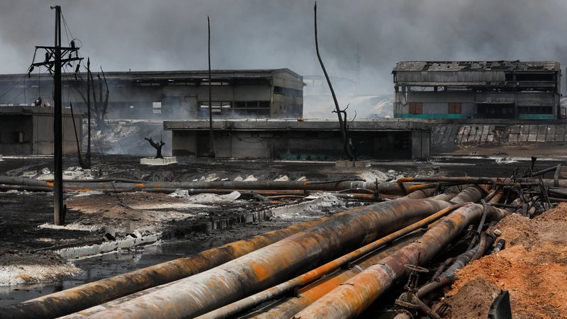 Fotografija: Požar v Matanzasu je grozljivo udaril po ljudeh, ki jim že šest desetletij ne dovolijo nobene spremembe. FOTO: Alexandre Meneghini/Reuters
