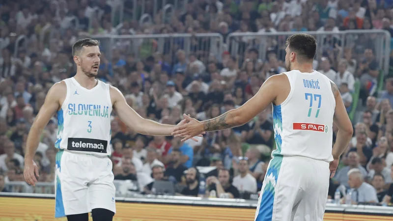 Fotografija: Z Goranom Dragićem in Luko Dončićem je bila Slovenija doslej nepremagljiva v tekmovalnih nastopih. FOTO: Leon Vidic/Delo