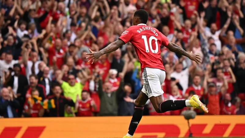 Fotografija: Marcus Rashford se veseli drugega zadetka Manchester Uniteda na Old Traffordu proti Arsenalu. FOTO: Oli Scarff/AFP
