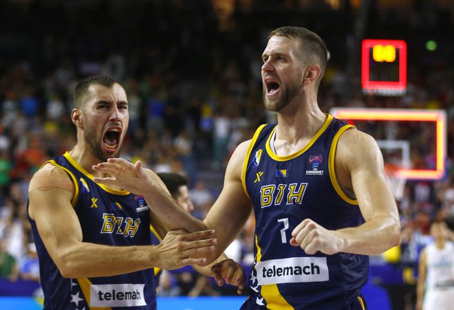 Slavje košarkarjev BiH je bilo nepopisno. FOTO: Thilo Schmuelgen/Reuters
