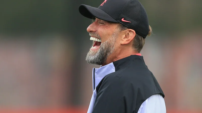 Fotografija: Liverpoolov trener Jürgen Klopp je »prvo vročo tekmo« v Neaplju že odigral na novinarski konferenci. FOTO: Lindsey Parnaby/AFP