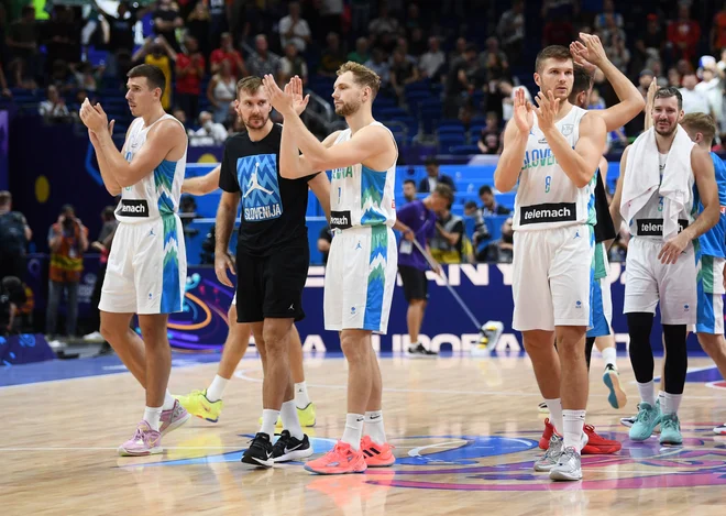 Slovenci so se zanesljivo uvrstili v četrtfinale. FOTO: Annegret Hilse/Reuters

