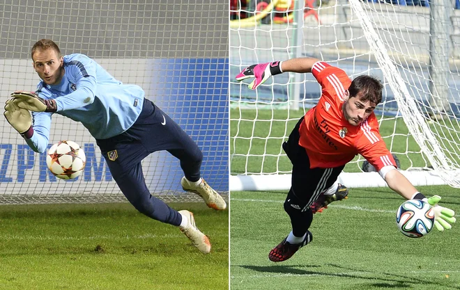 Jan Oblak (levo) se je v izboru Ikerja Casillasa (desno) znašel na tretjem mestu med današnjimi najboljšimi vratarji. FOTO: Gerard Julien/AFP

