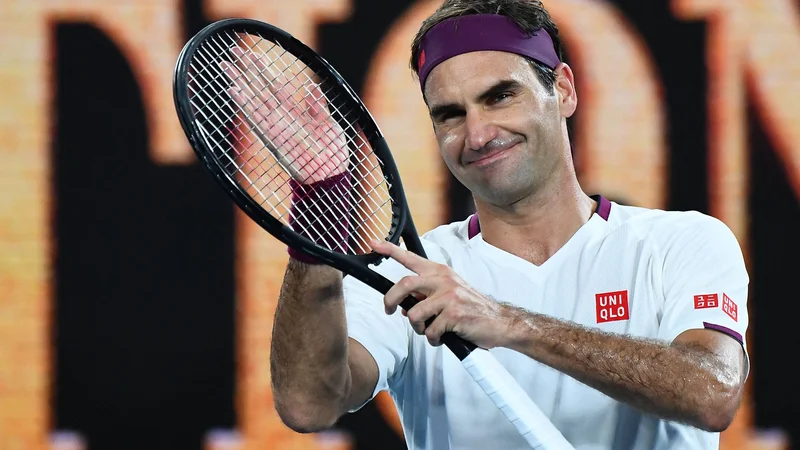 Fotografija: Roger Federer bo teniški lopar obesil na klin. FOTO: William West/AFP