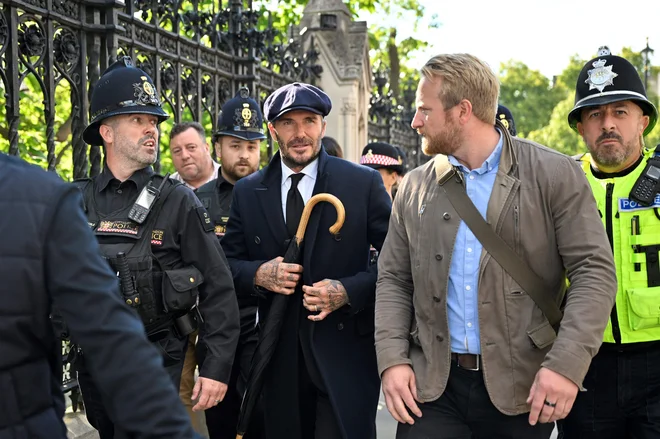 V vrsti je čakal tudi nogometaš David Beckham. FOTO: Louisa Gouliamaki/AFP
