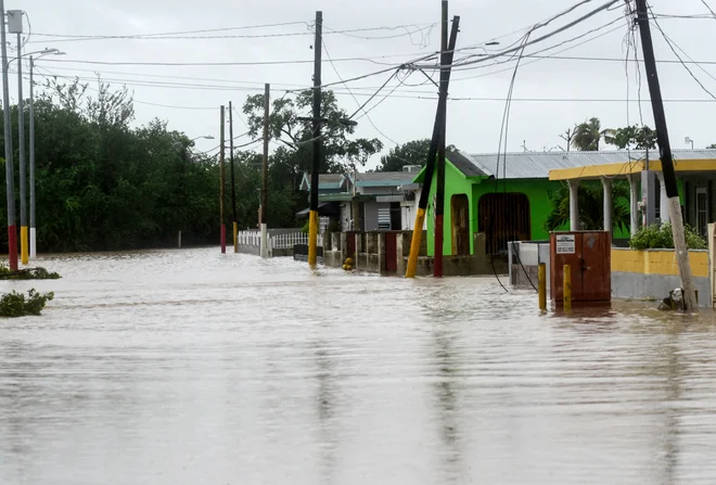 Poplavljena ulica v Portoriku. FOTO: Jose Rodriguez/AFP
