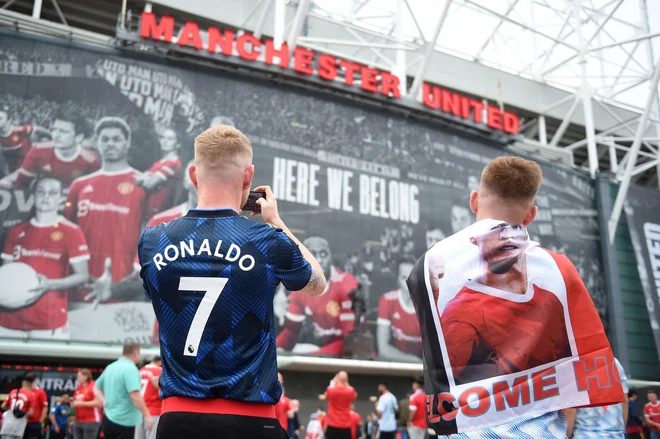 Priljubljenost Cristiana Ronalda je med privrženci Manchester Uniteda izjemna. FOTO: Oli Scarff/AFP