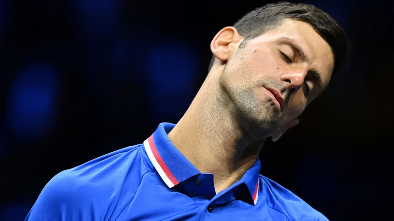 Fotografija: Novak Đoković (na fotografiji) ni našel recepta za 22-letnega Kanadčana. FOTO: Glyn Kirk/AFP