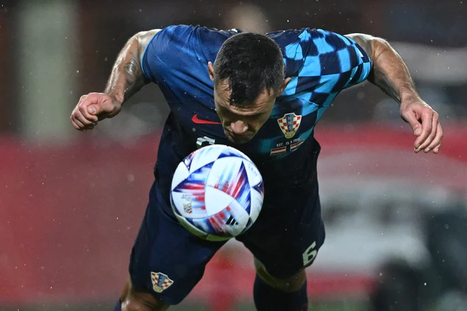 Dejan Lovren je zabil tretji gol za zmago Hrvaške nad Avstrijo. FOTO: Joe Klamar/AFP
