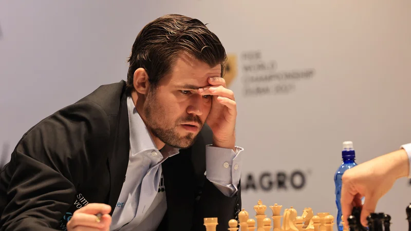 Fotografija: Magnus Carlsen ni varčeval s kritikami na račun goljufanja v šahu. FOTO: Giuseppe Cacace/AFP