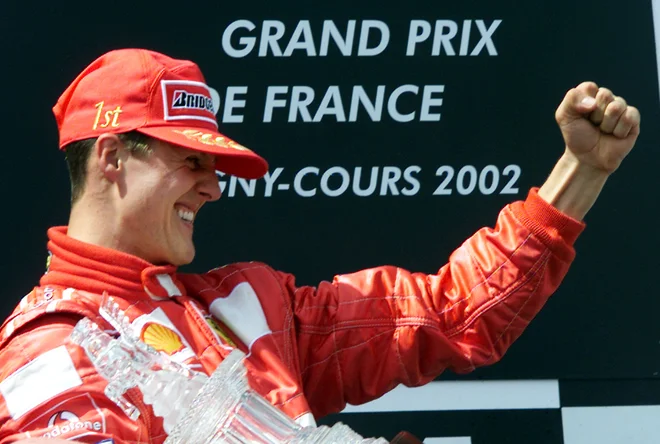 Michael Schumacher, kot se ga spomnijo njegovi oboževalci. FOTO: Jean-Paul Pelissier/Reuters
