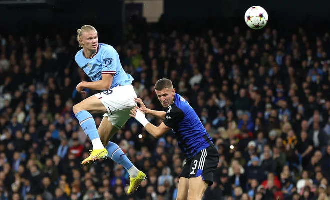 Erling Braut Haaland (levo) je proti Kopenhagnu dvakrat zadel v polno. FOTO: Lee Smith/Reuters
