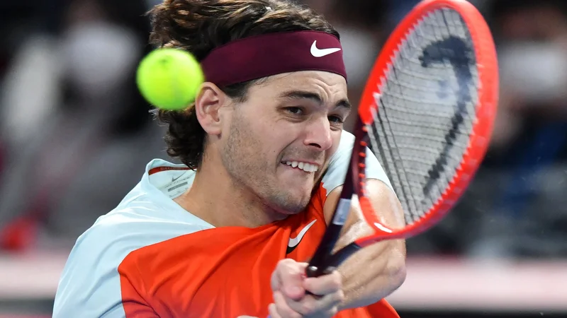 Fotografija: Taylor Fritz (na fotografiji) med obračunom s Kanadčanom Denisom Shapovalovom. FOTO: Kazuhiro Nogi/AFP