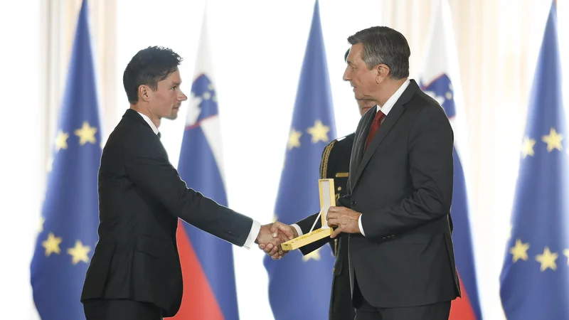 Fotografija: Predsednik Borut Pahor z občudovanjem spremlja kariero Primoža Rogliča. FOTO: Jože Suhadolnik/Delo