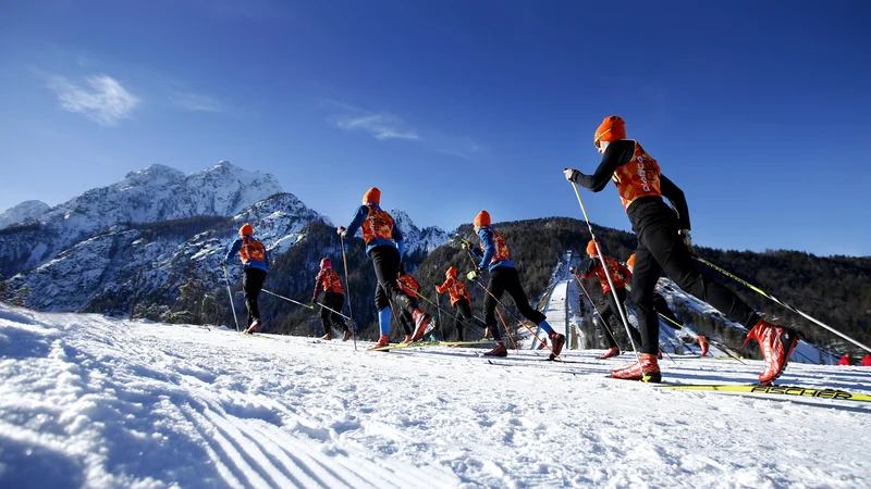 Fotografija: Tekači in tekačice na SP v obeh maratonih ne bodo startali v Italiji, vsa tekma bo v Planici. FOTO: Matej Družnik