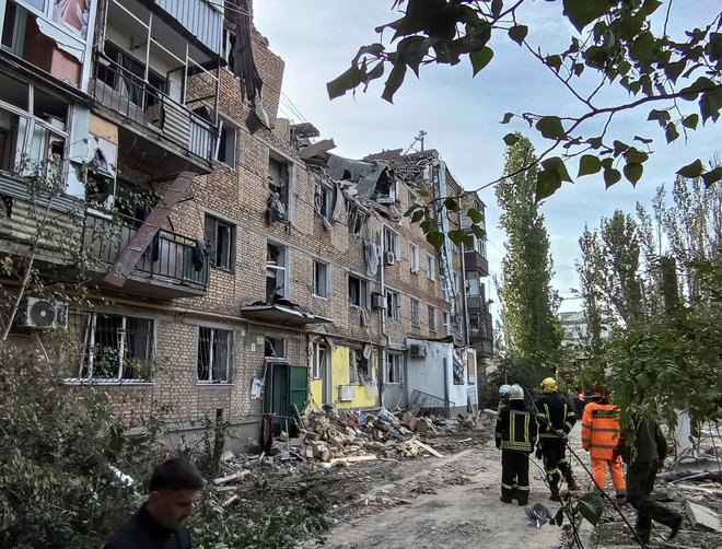 Porušene stavbe v Mikolajevu. FOTO: Reuters
