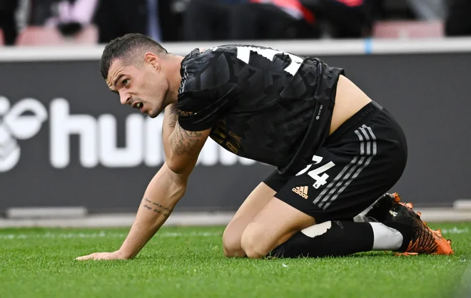 Granit Xhaka in soigralci so osvojili točko. FOTO: Dylan Martinez/Reuters
