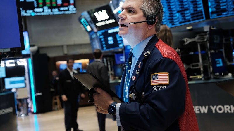 Fotografija: Newyorška borza  NYSE je 2,6 odstotno rast v tretjem četrtletju pozdravila s pozitivnim gibanjem.  Foto Spencer Platt/Afp
