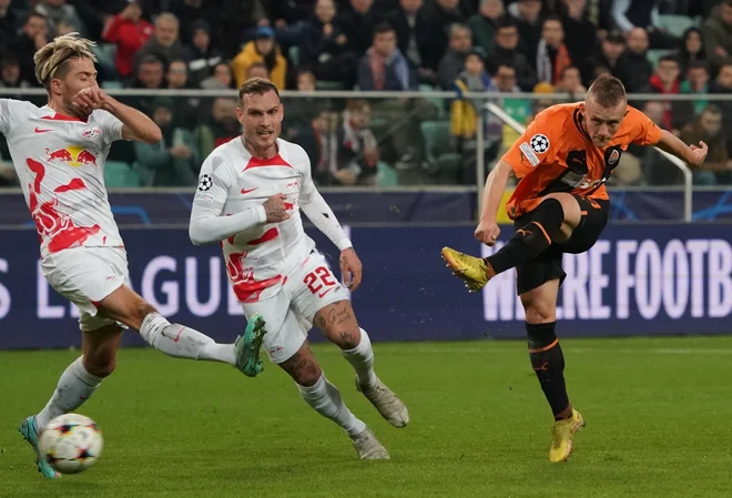 Kevin Kampl (levo) se je z Leipzigom uvrstil v izločične boje. FOTO: Janek Skarzynski/AFP
