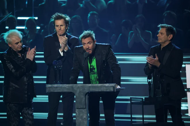 Simon Le Bon je nagovoril zbrane na otvoritveni slovesnosti v Los Angelesu. FOTO: Mario Anzuoni/Reuters
