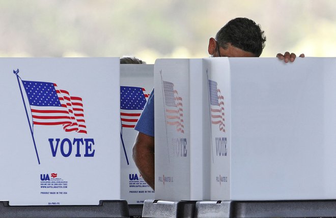 Volivci v floridskem Kissimmeeju FOTO: Gregg Newton/AFP
