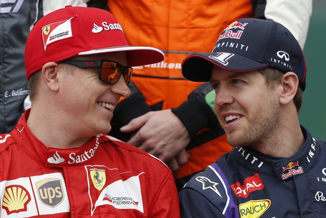 Kimi Räikkönen (levo) je bil tekmec Sebastianu Vettlu, potem pa tudi moštveni kolega. FOTO: Brandon Malone/Reuters
