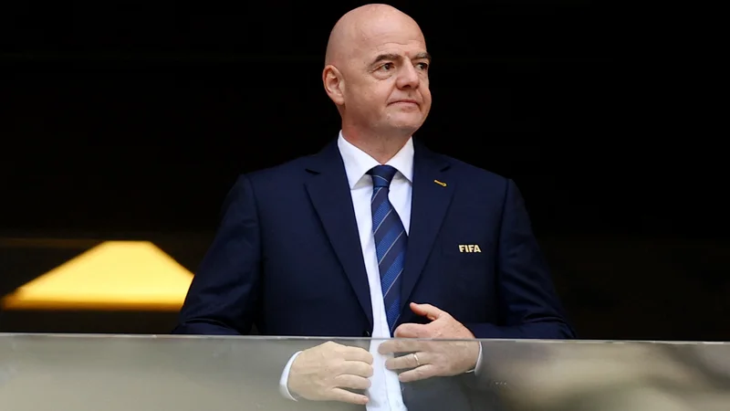 Fotografija: Gianni Infantino je z bizarnim govorom v Katarju požel val neodobravanja. FOTO: Hannah Mckay/Reuters