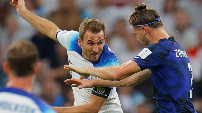 Fotografija: Angleški kapetan Harry Kane ni imel rešitev proti ameriški obrambi. FOTO: Odd Andersen/AFP