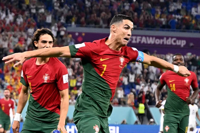 Cristiano Ronaldo se je takole veselil gola na tekmi z Gano. FOTO: Patricia De Melo Moreira/AFP
