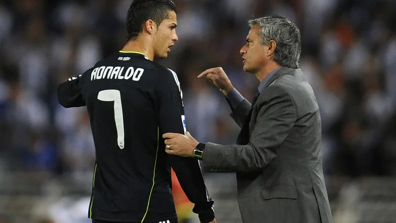 Fotografija: Cristiano Ronaldo in Jose Mourinho iz leta 2010, ko sta bila del madridskega Reala. FOTO: Felix Ausin Ordonez/Reuters