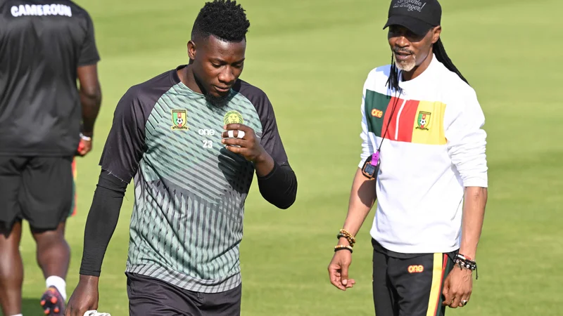 Fotografija: Rigobert Song je imel dovolj muhastega Andreja Onanaja in mu je pokazal pot domov. FOTO: Issouf Sanogo/AFP